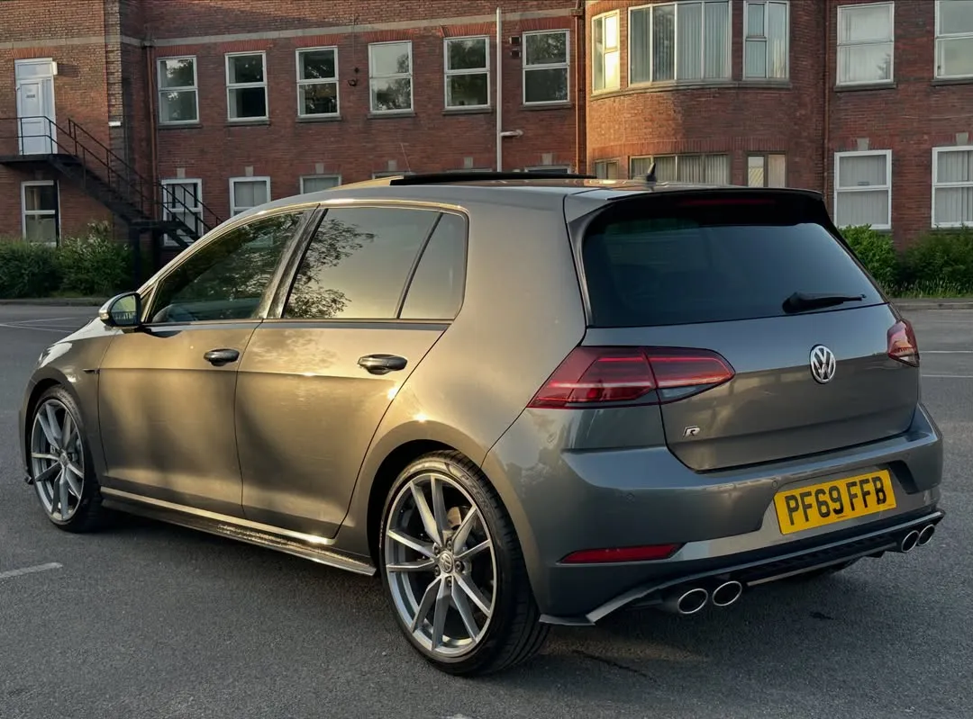 2019 Volkswagen Golf R (Mk7.5) Performance Pack: Rear three-quarter view by a brick building