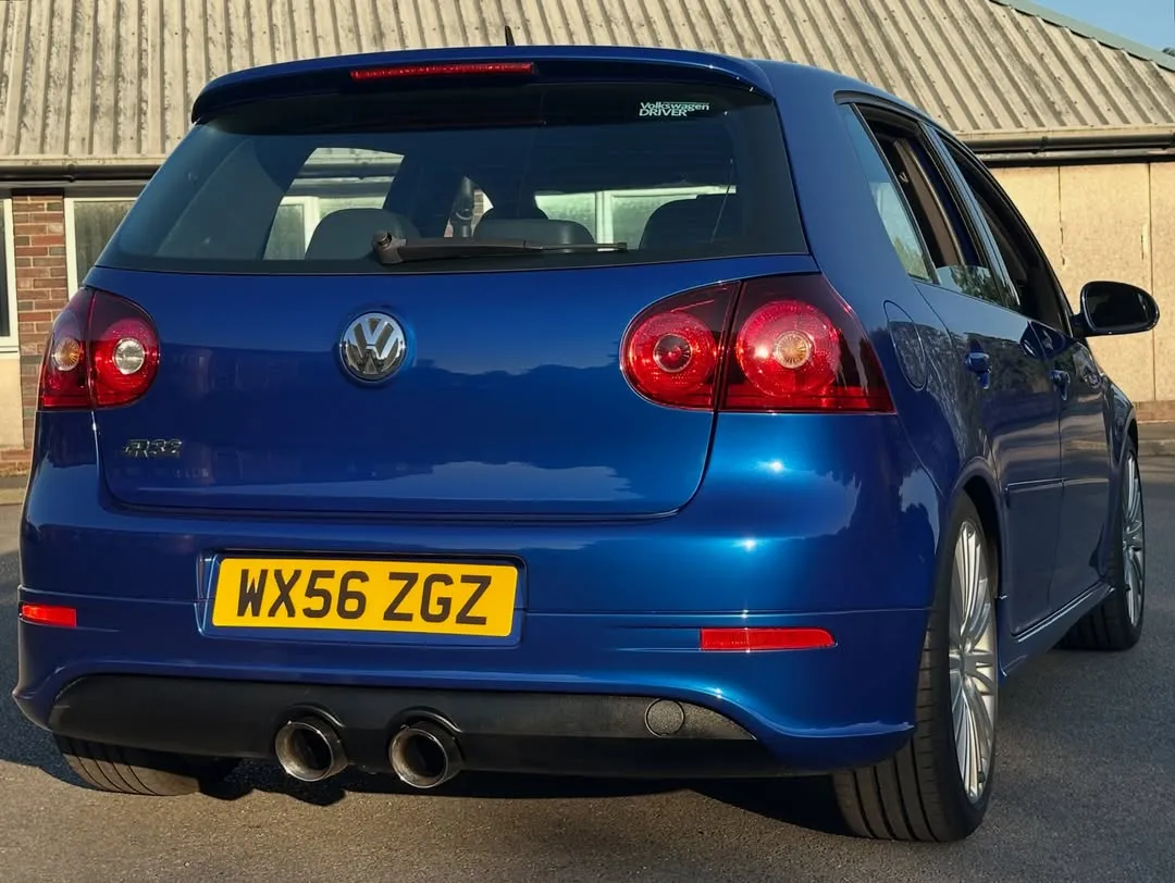 2006 Volkswagen Golf R32 (Mk5) Supercharged: Rear three-quarter view by a workshop