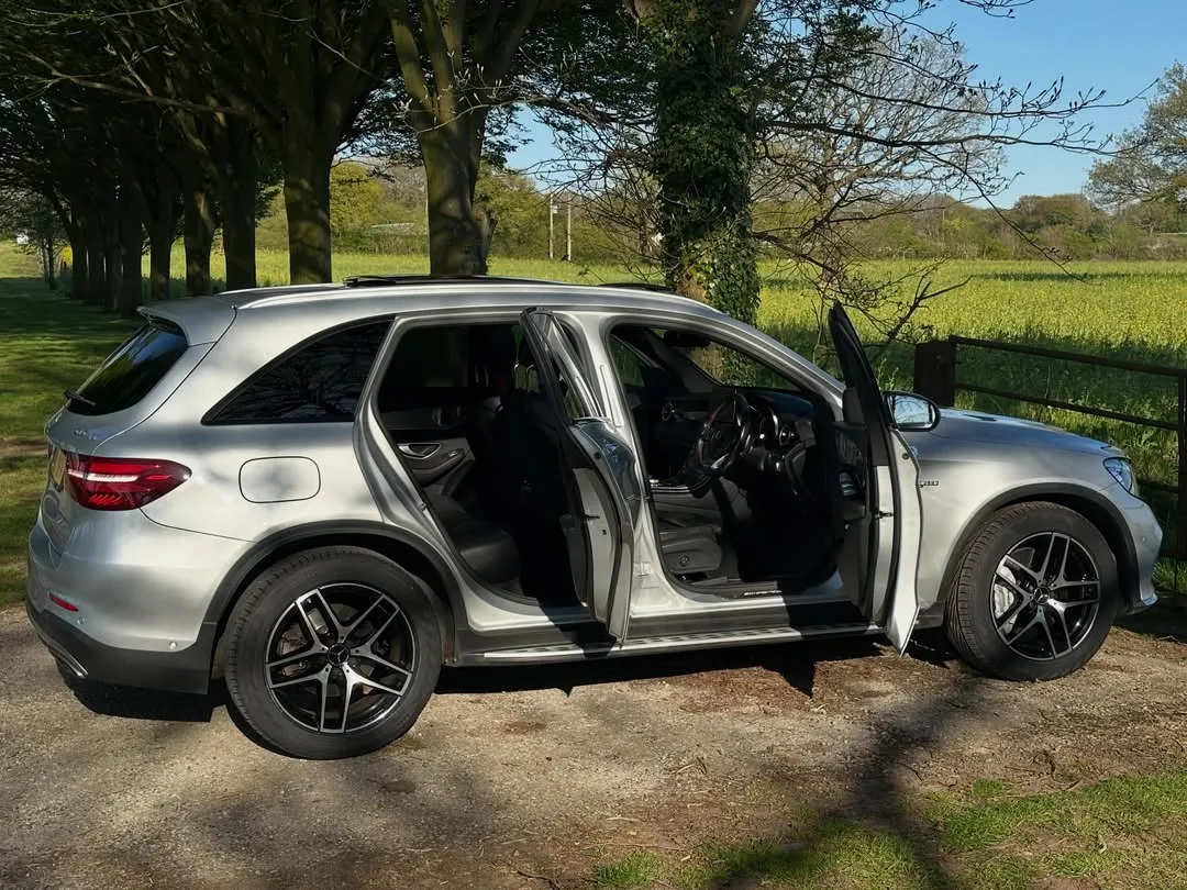2017 Mercedes-AMG GLC 43 4MATIC: Side view with every door open